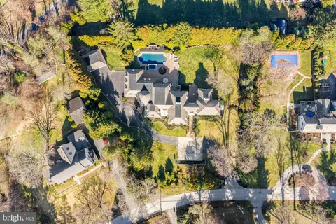 an aerial view of a house with a garden