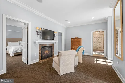 a spacious bedroom with a bed and a cabinets