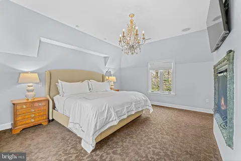 a spacious bathroom with a double vanity sink and a mirror