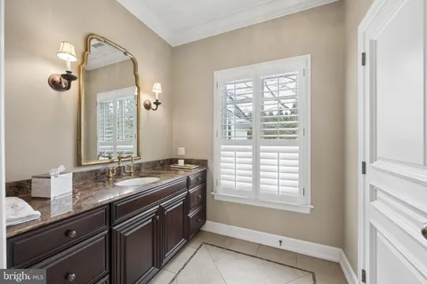 a utility room with sink dryer and washer