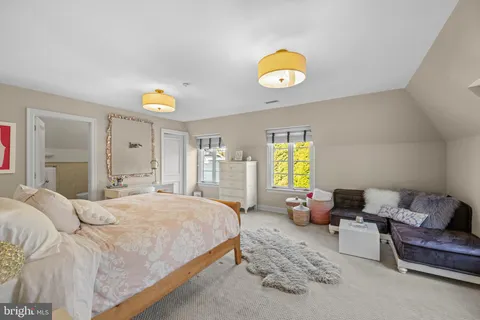 a view of swimming pool with outdoor seating