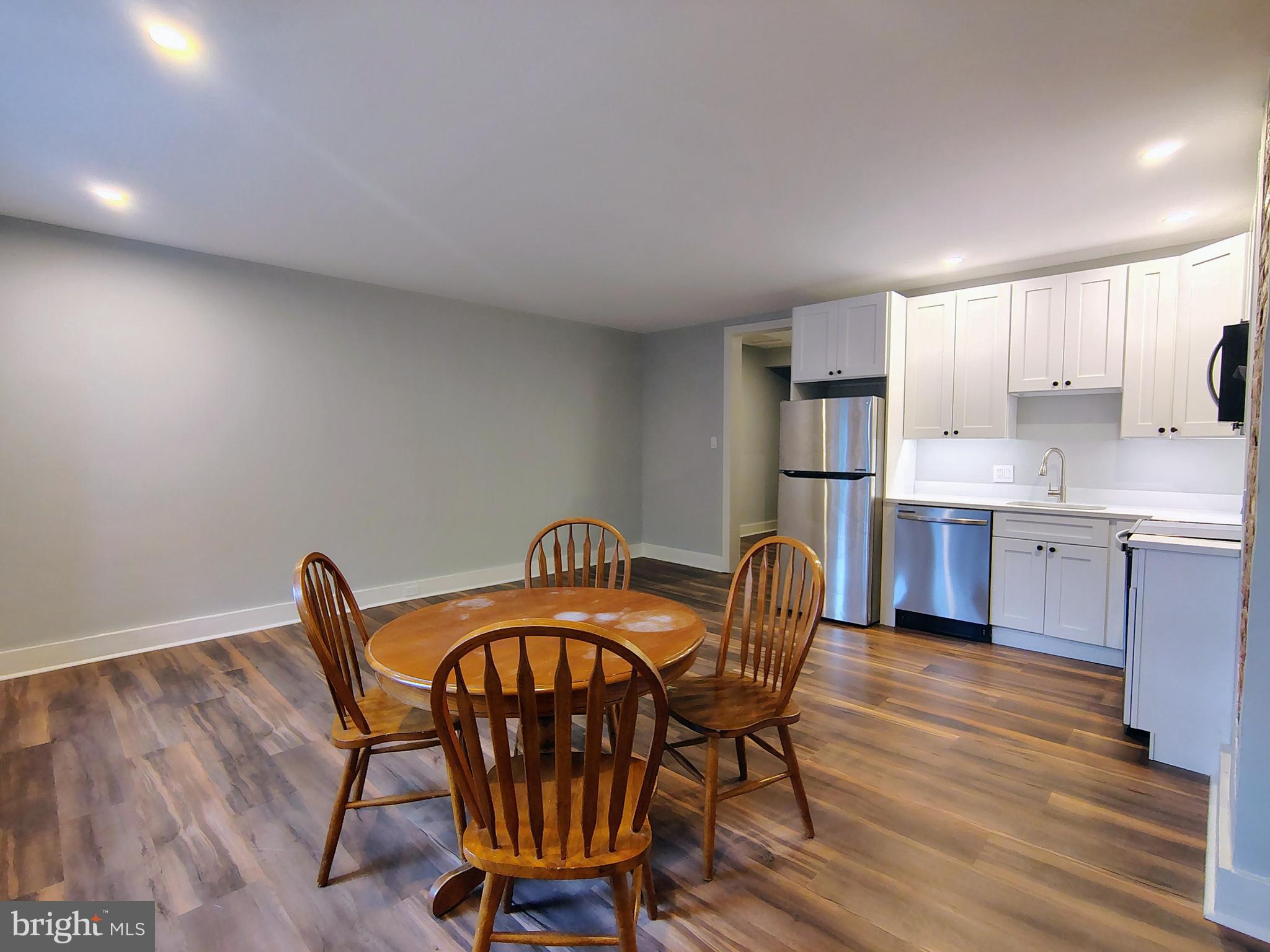 230 South Market Street, Unit 3 Frederick, MD 21701 - Photo 12 of 16 a dining room with furniture and window