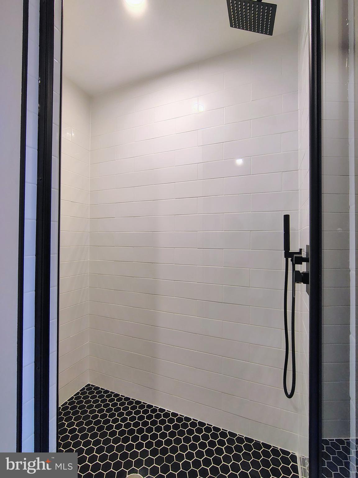 230 South Market Street, Unit 3 Frederick, MD 21701 - Photo 7 of 16 a bathroom with a shower