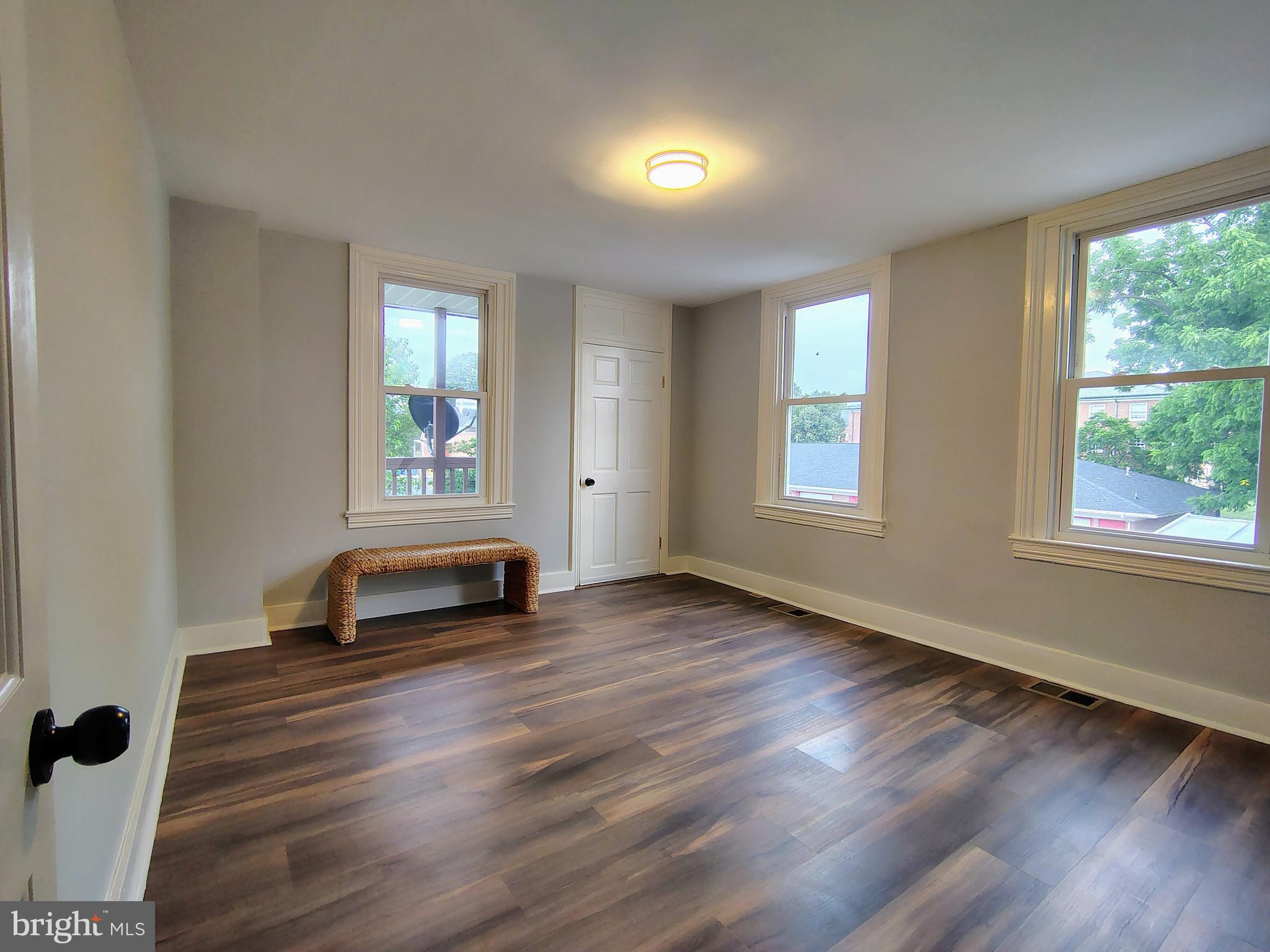 230 South Market Street, Unit 3 Frederick, MD 21701 - Photo 9 of 16 a view of a room with wooden floor and windows