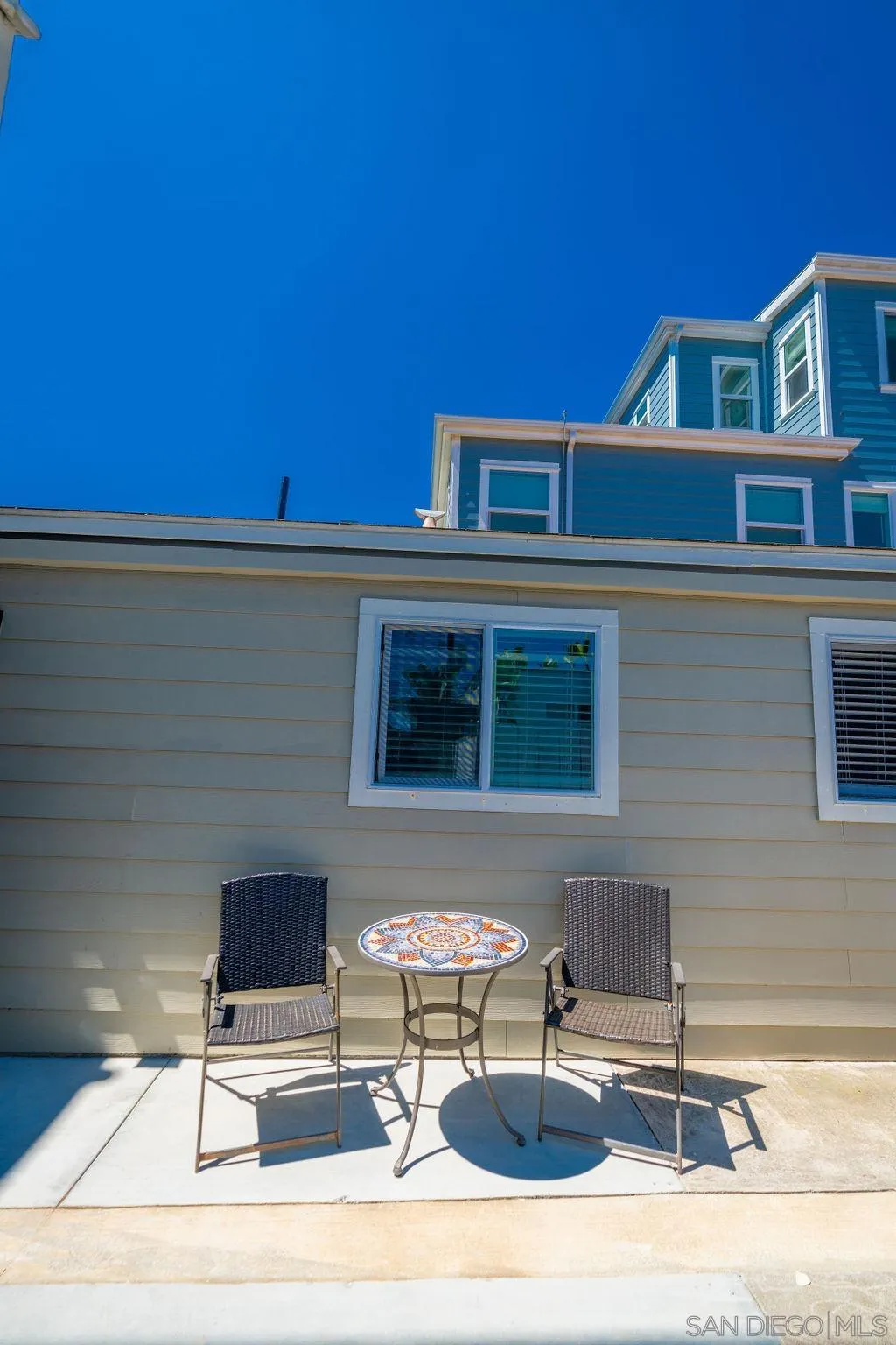 841 Beryl Street, Unit A San Diego, CA 92109 - Photo 22 of 22 a backyard of a house with seating space