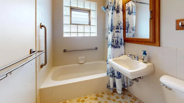 a bathroom with a sink and a bathtub
