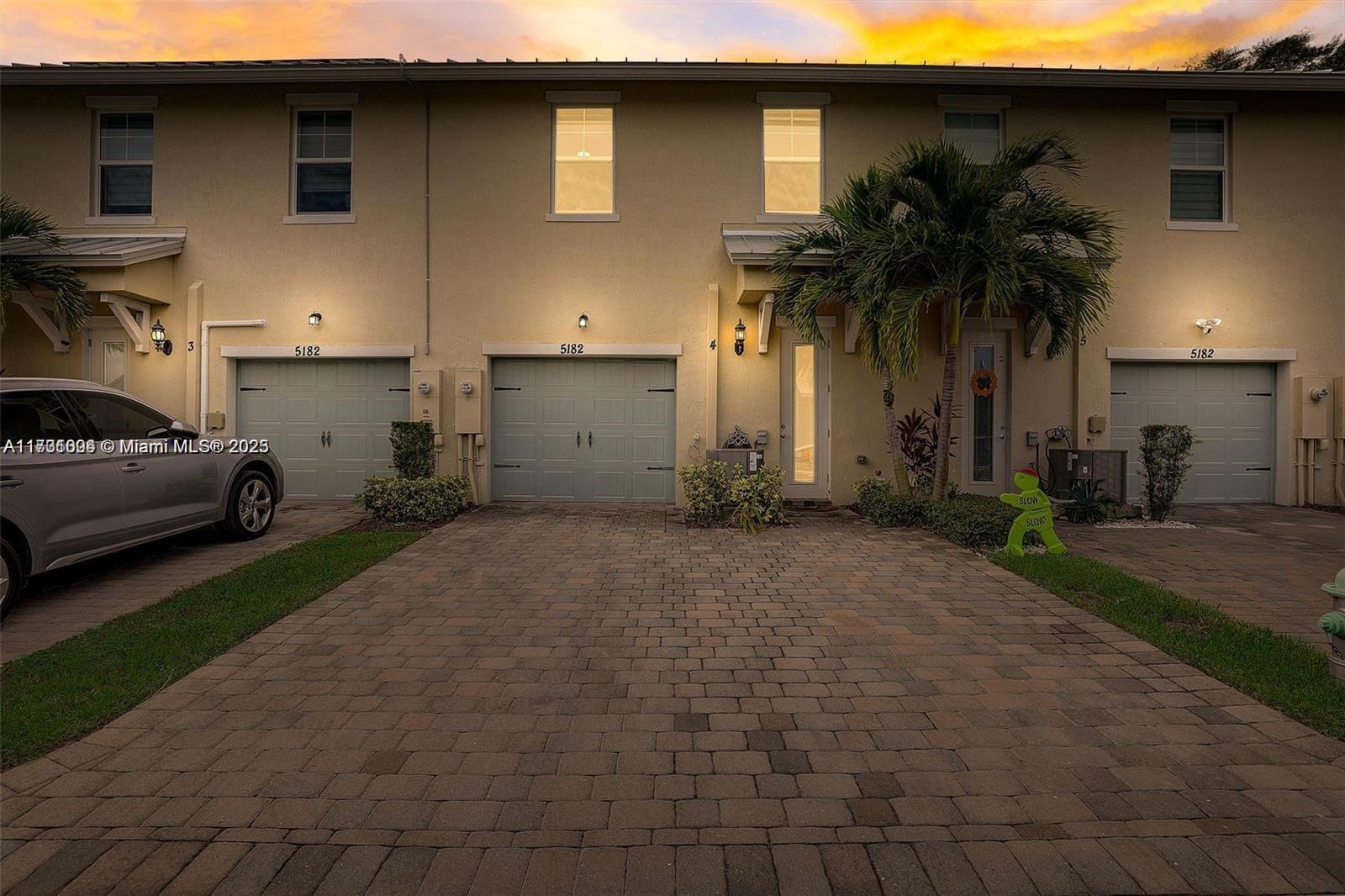 5182 Eucalyptus Drive, Unit 4 Hollywood, FL 33021 - Photo 3 of 22 a view of a street with cars parked