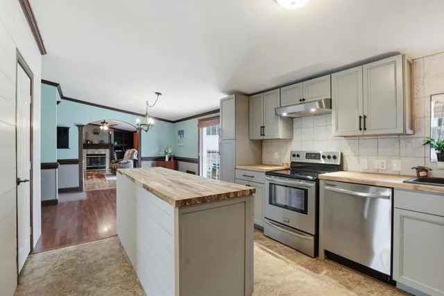 a bathroom with a toilet a sink and a mirror