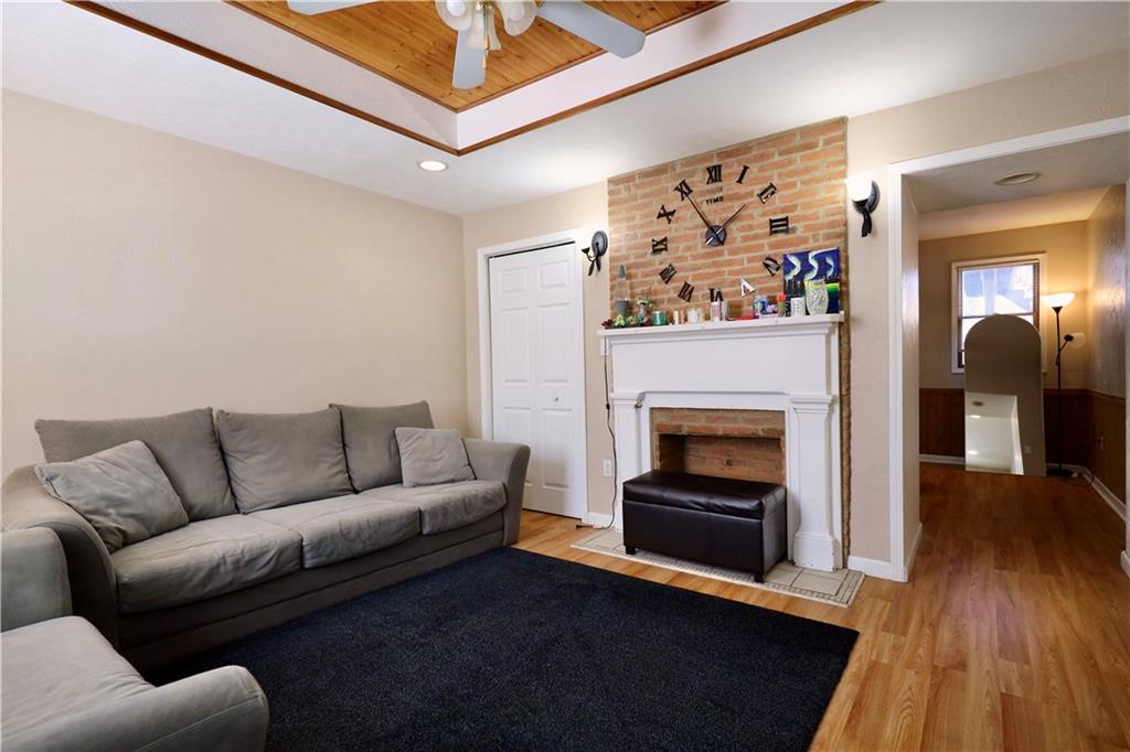 1923 Wharton Street Pittsburgh, PA 15203 - Photo 6 of 34 a living room with furniture and a fireplace