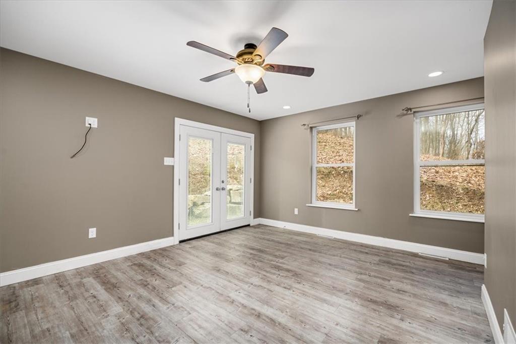 720 Conway Wallrose Road Freedom, PA 15042 - Photo 16 of 25 a view of an empty room with a window