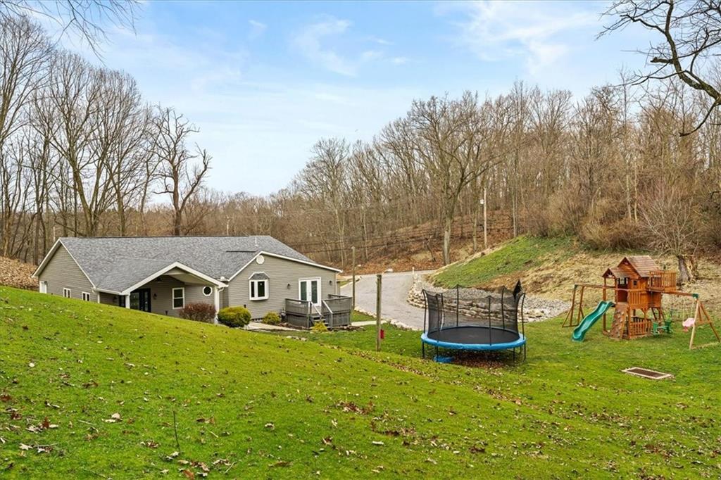 720 Conway Wallrose Road Freedom, PA 15042 - Photo 24 of 25 a view of a house with a yard