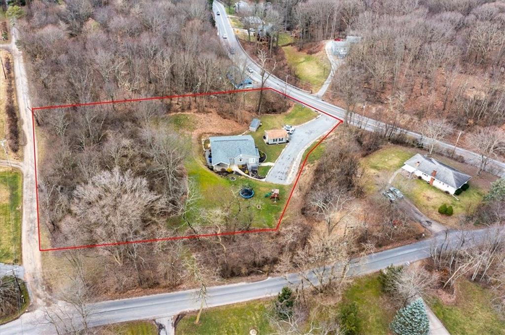 720 Conway Wallrose Road Freedom, PA 15042 - Photo 25 of 25 a backyard of a house with outdoor seating