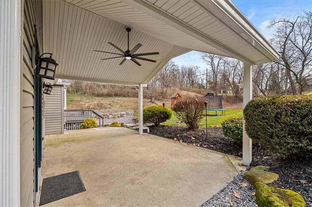 720 Conway Wallrose Road Freedom, PA 15042 - Photo 3 of 25 a view of a porch with furniture and a yard