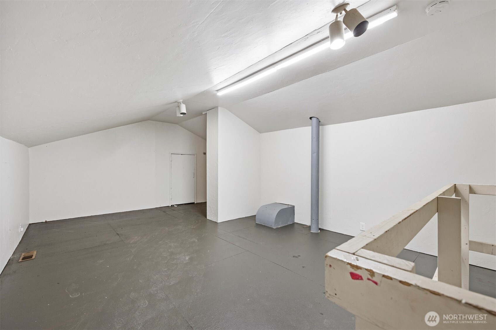 18928 Bow Hill Road Burlington, WA 98233 - Photo 27 of 39 a view of a room with wooden floor