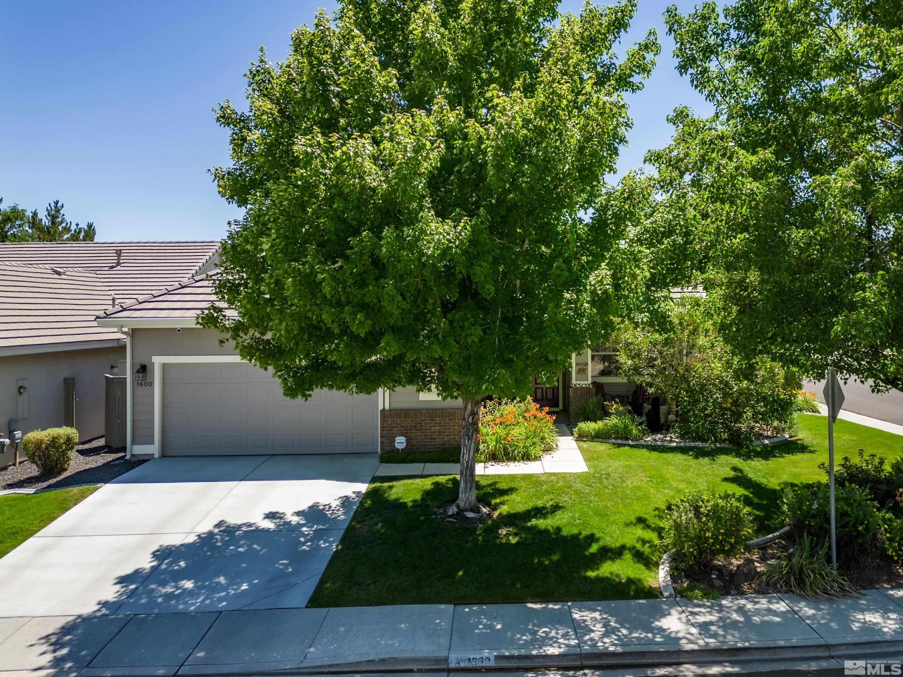 1600 Red Gulch Court Reno, NV 89521 - Photo 1 of 39 a front view of a house with a yard