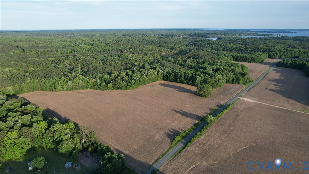 108.5-ac Buzzards Neck Road Lancaster, VA 22503 - Photo 16 of 50 an aerial view of a house with a yard and lake view
