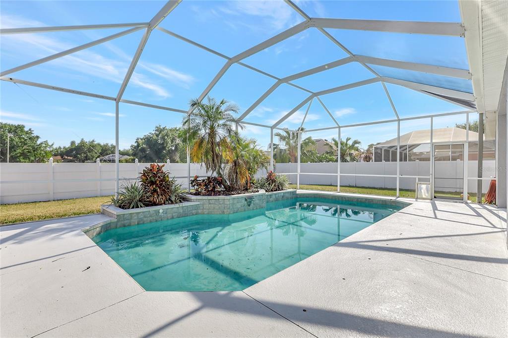 2863 Duncan Tree Circle Valrico, FL 33594 - Photo 52 of 53 a view of a backyard with swimming pool