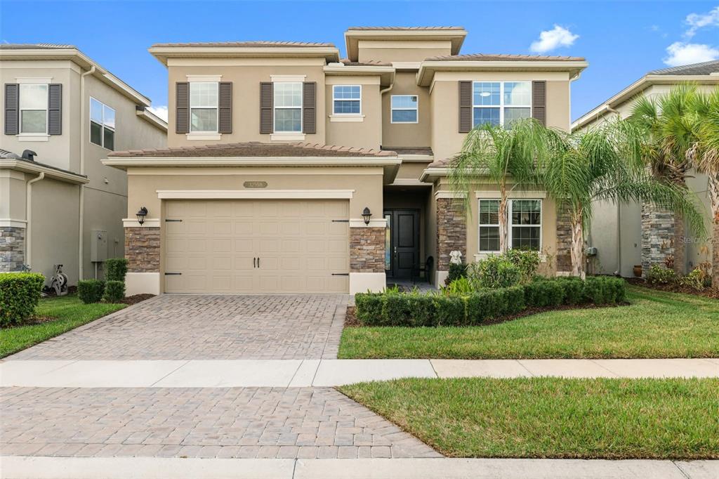32558 Tree Of Life Avenue Wesley Chapel, FL 33543 - Photo 1 of 73 a house view with a garden space