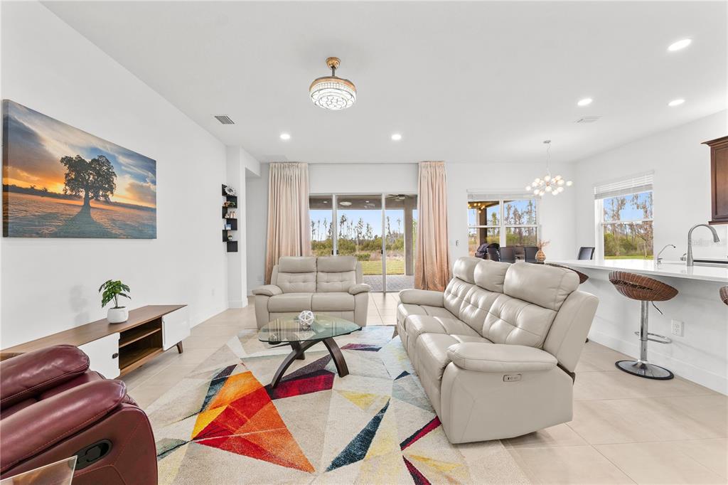 32558 Tree Of Life Avenue Wesley Chapel, FL 33543 - Photo 6 of 73 a living room with furniture and a window