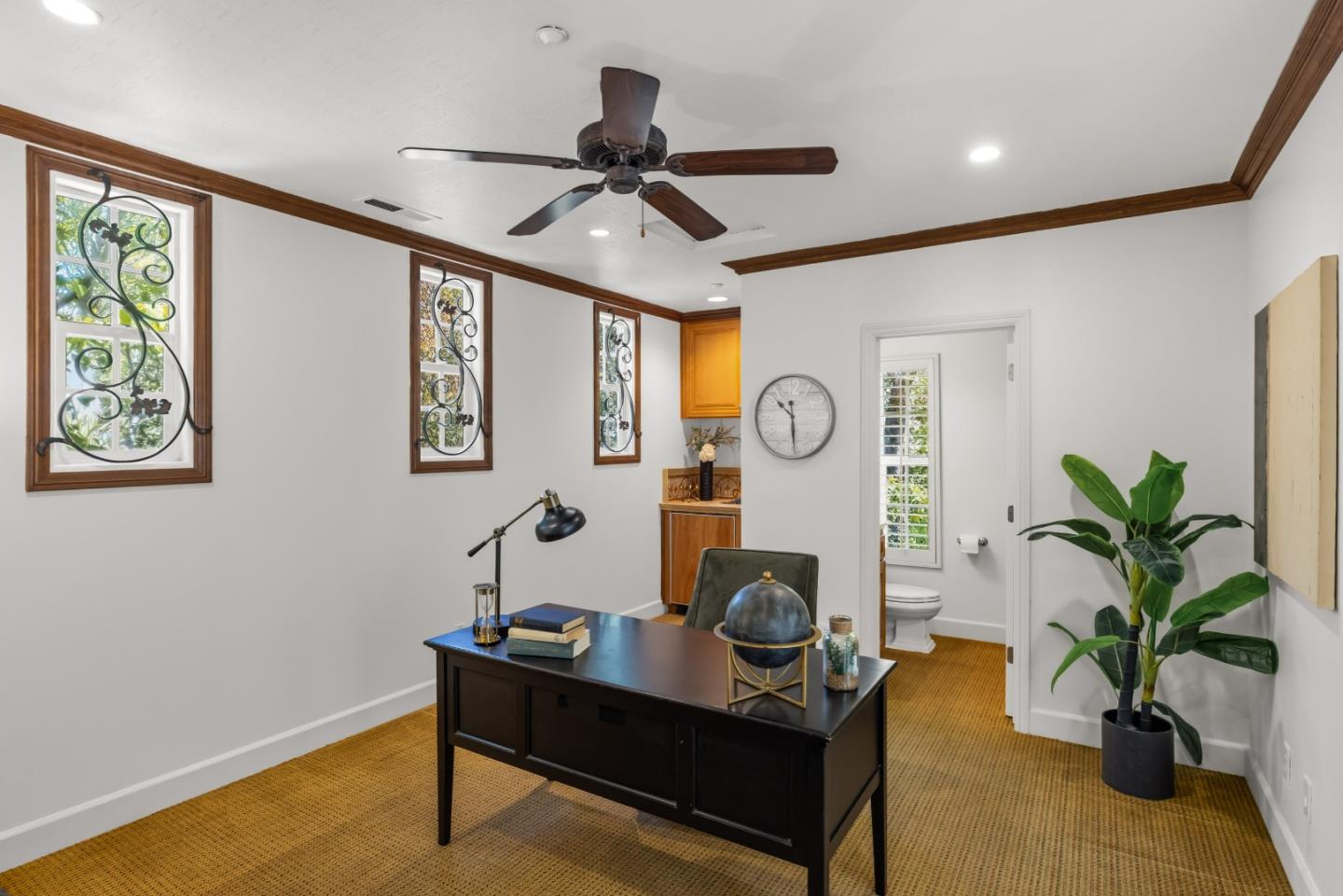 302 Pasadera Drive Monterey, CA 93940 - Photo 23 of 40 a view of a workspace with furniture and a potted plant