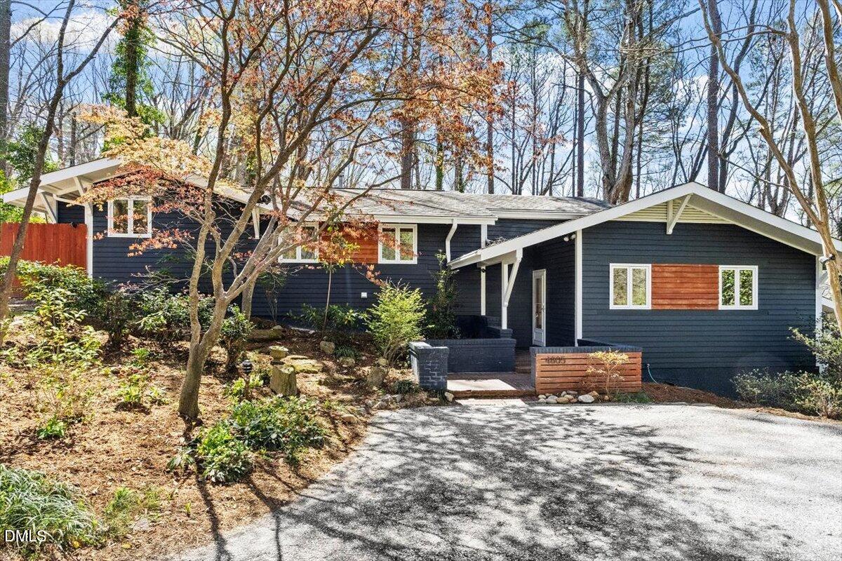 4805 Rembert Drive Raleigh, NC 27612 - Photo 2 of 45 a front view of a house with a yard