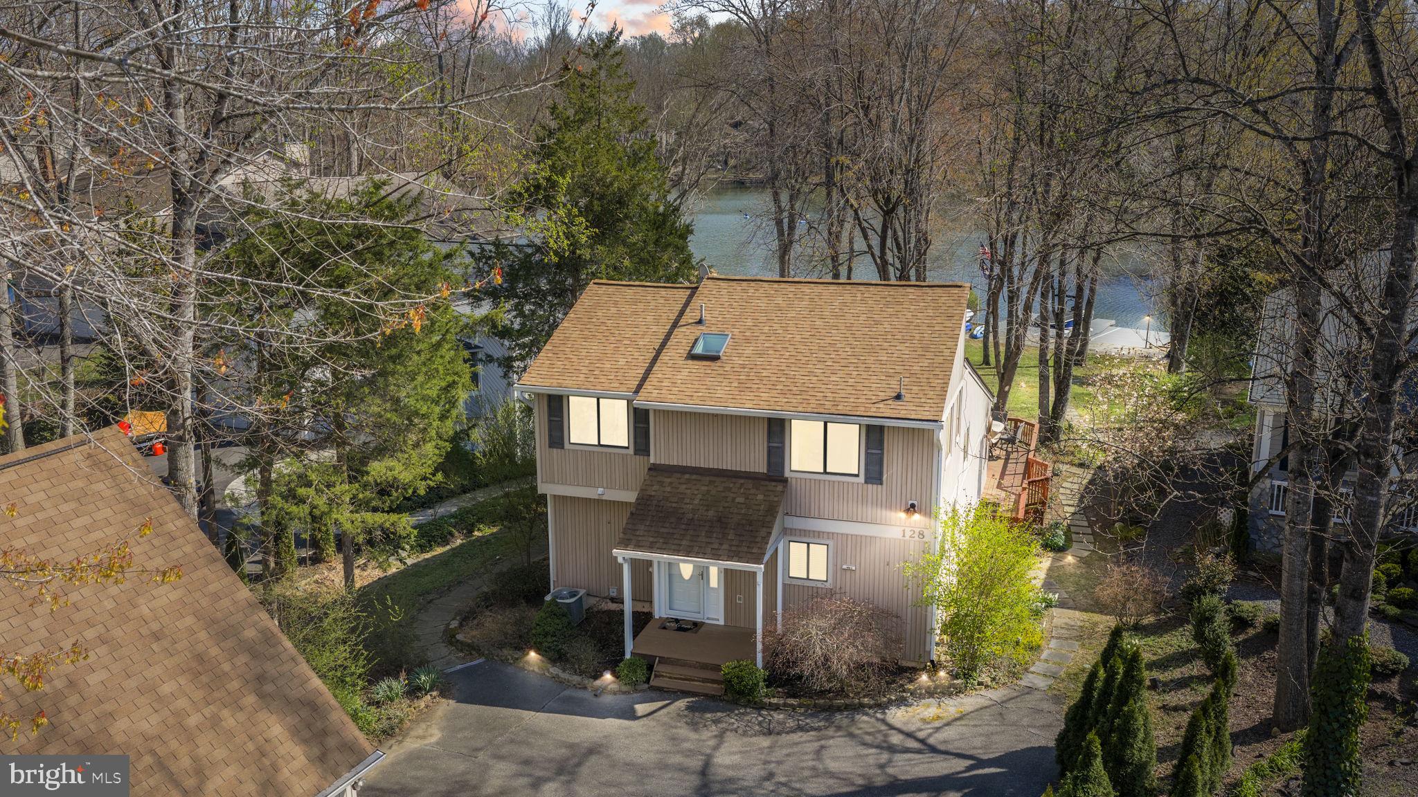 128 Harrison Circle Locust Grove, VA 22508 - Photo 1 of 65 front view of a house with a yard
