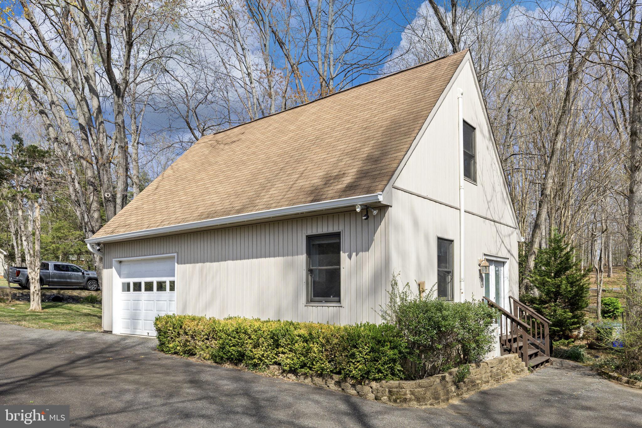 128 Harrison Circle Locust Grove, VA 22508 - Photo 25 of 65 a view of a house with a yard
