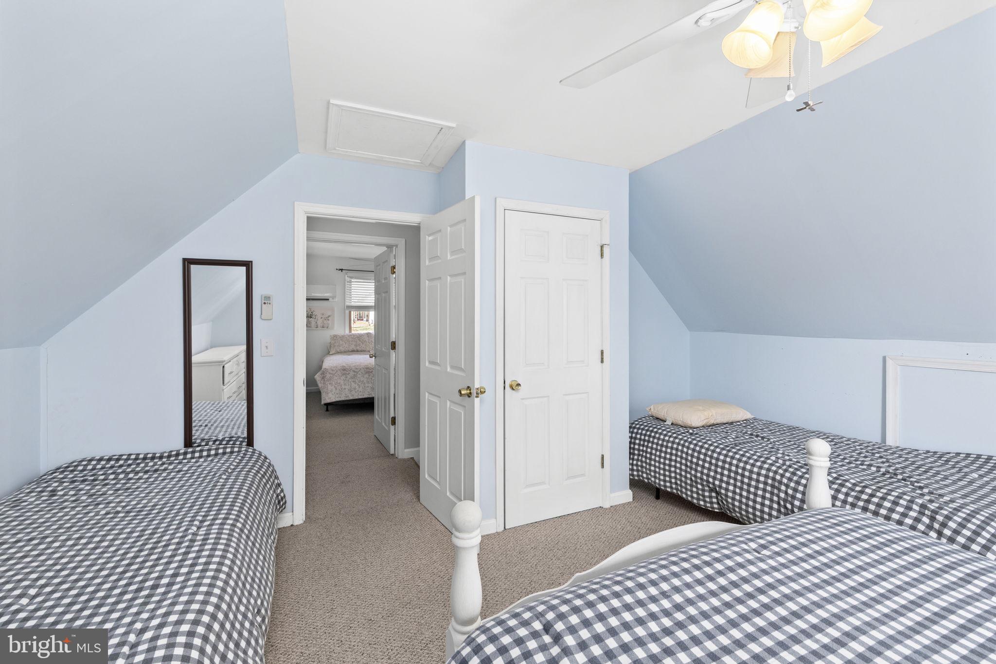 128 Harrison Circle Locust Grove, VA 22508 - Photo 32 of 65 a bedroom with a bed and a lamp on dresser