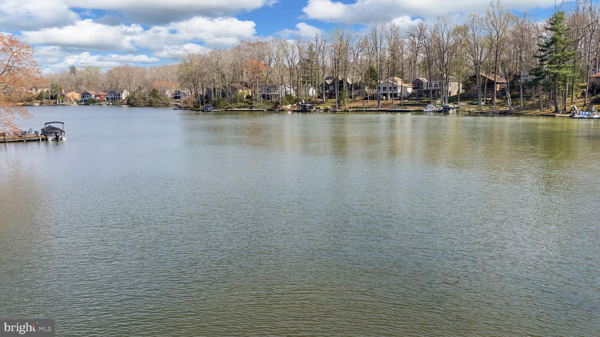 128 Harrison Circle Locust Grove, VA 22508 - Photo 49 of 65 a view of a lake with boats