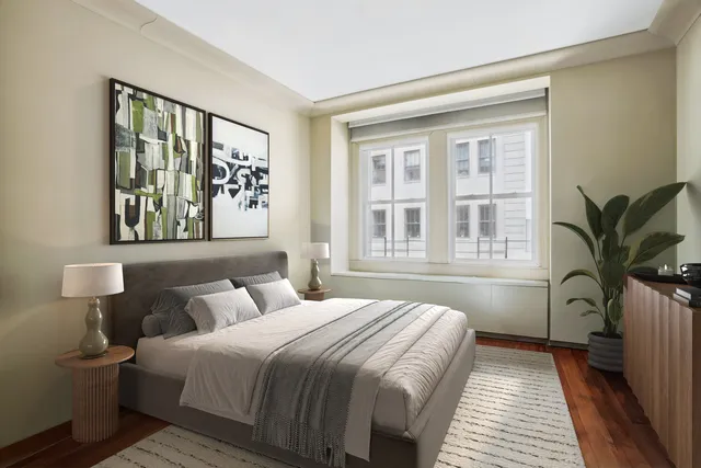 a living room with stainless steel appliances kitchen island granite countertop a stove a sink and a refrigerator