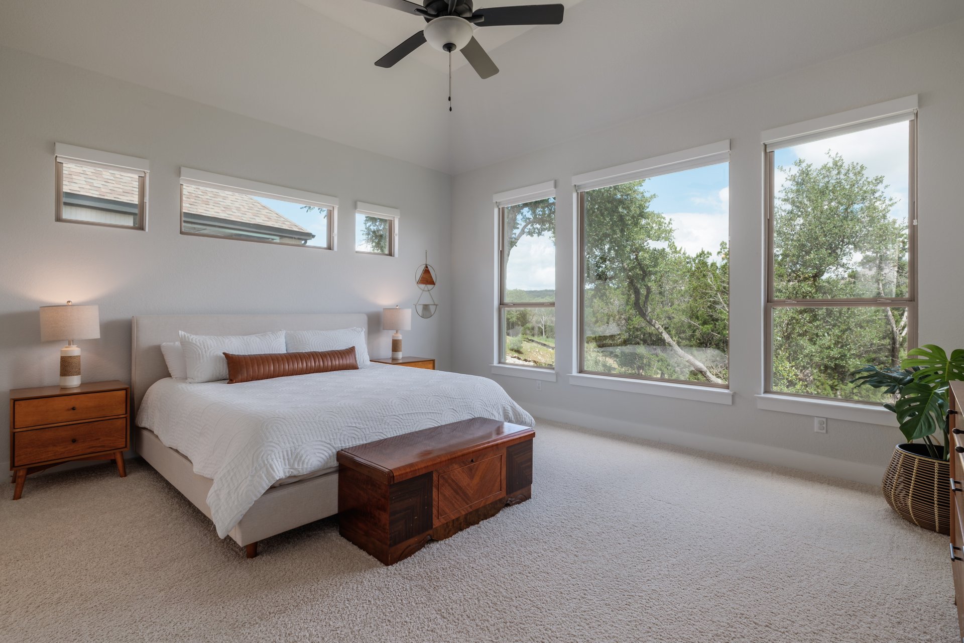 317 Autumn Oak Way Georgetown, TX 78628 - Photo 5 of 40 a spacious bedroom with a bed and a couch