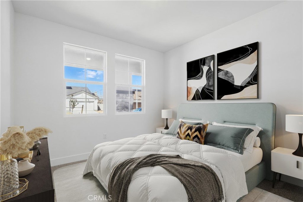 1872 Vincent Drive Palmdale, CA 93551 - Photo 7 of 10 a bedroom with a bed and wall painting