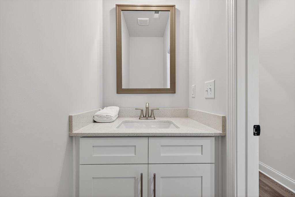 17 Sparks Way Austell, GA 30106 - Photo 17 of 69 a bathroom with a sink and a mirror