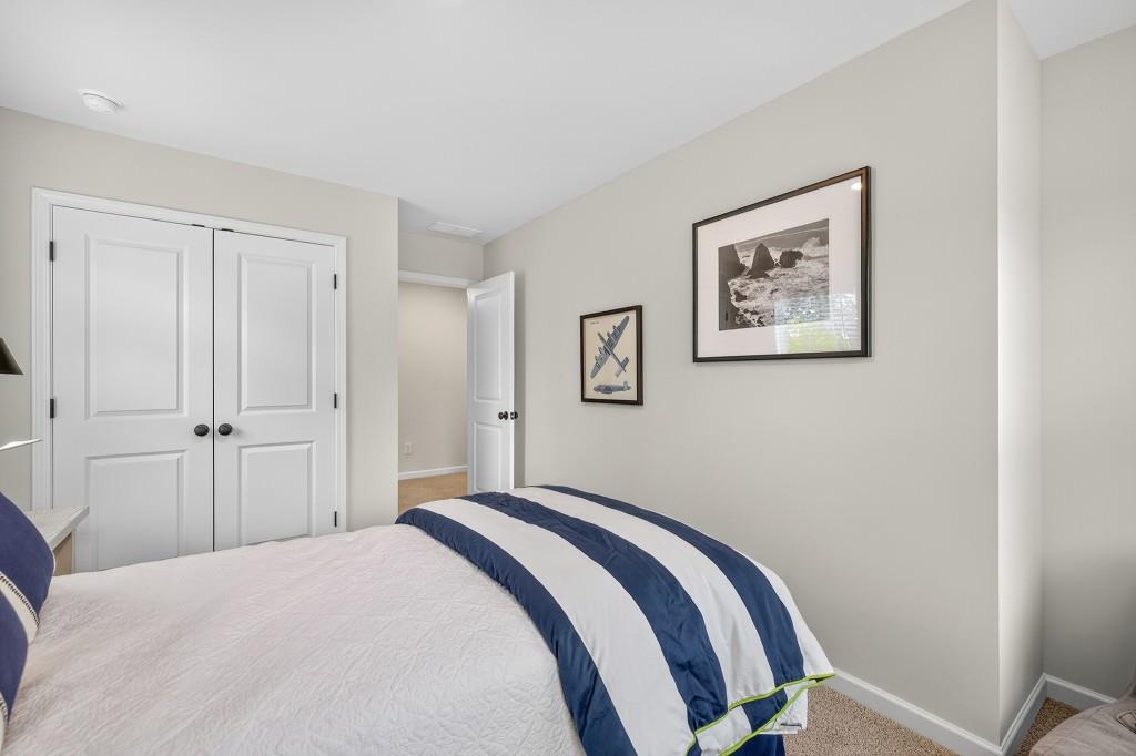 17 Sparks Way Austell, GA 30106 - Photo 28 of 69 a bedroom with a bed and painting on the wall