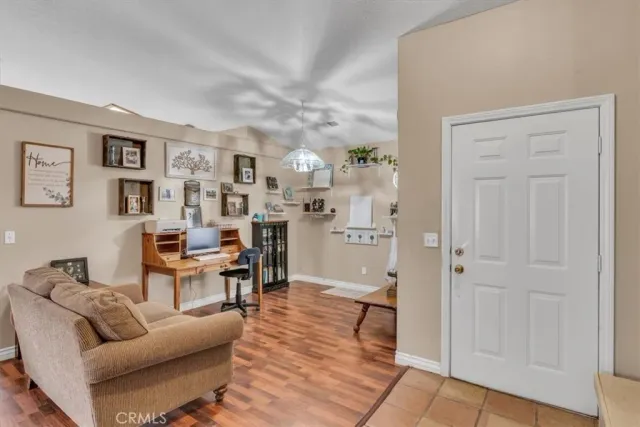 a living room with furniture and a table