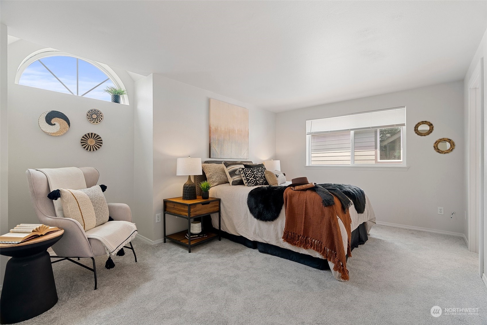 226 Whitman Place Northeast Renton, WA 98059 - Photo 16 of 26 a bed room with a bed and a chair
