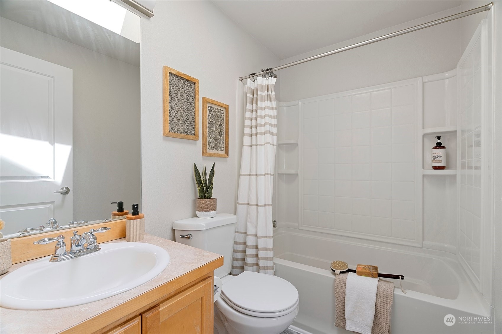 226 Whitman Place Northeast Renton, WA 98059 - Photo 23 of 26 a bathroom with a sink toilet and shower