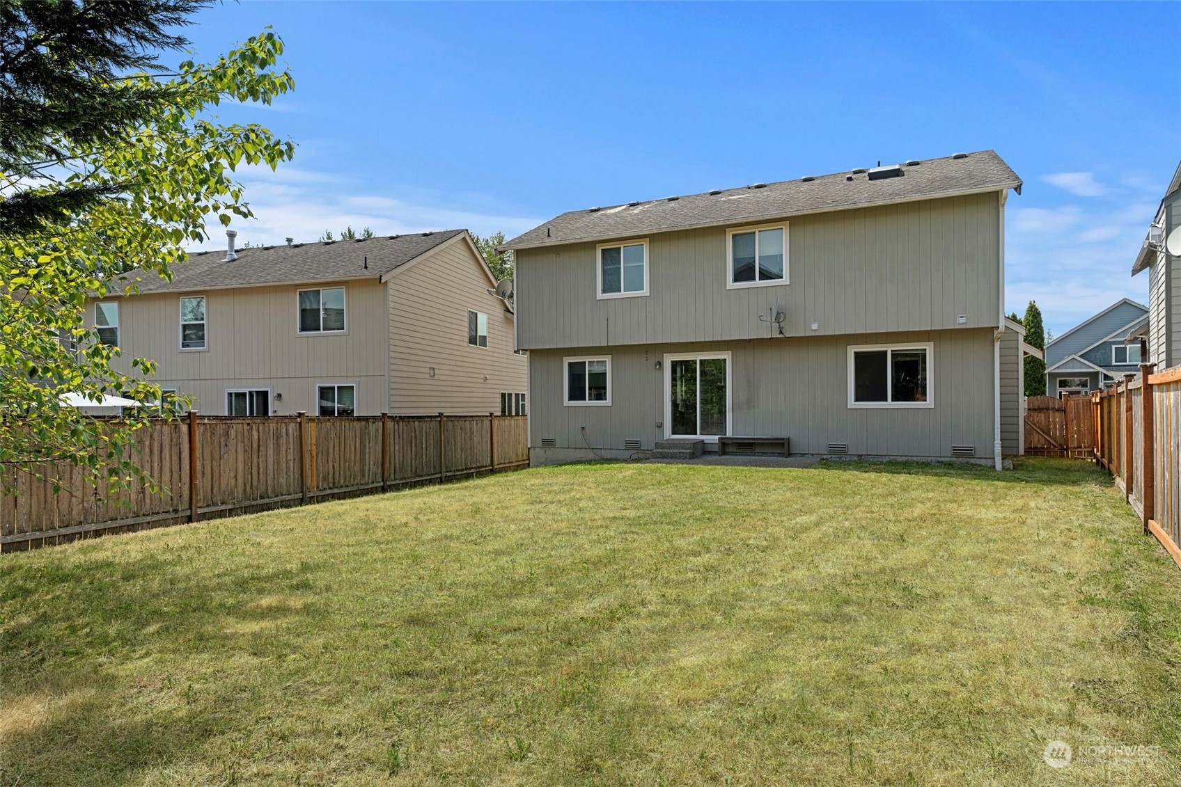 226 Whitman Place Northeast Renton, WA 98059 - Photo 25 of 26 a front view of a house with a yard