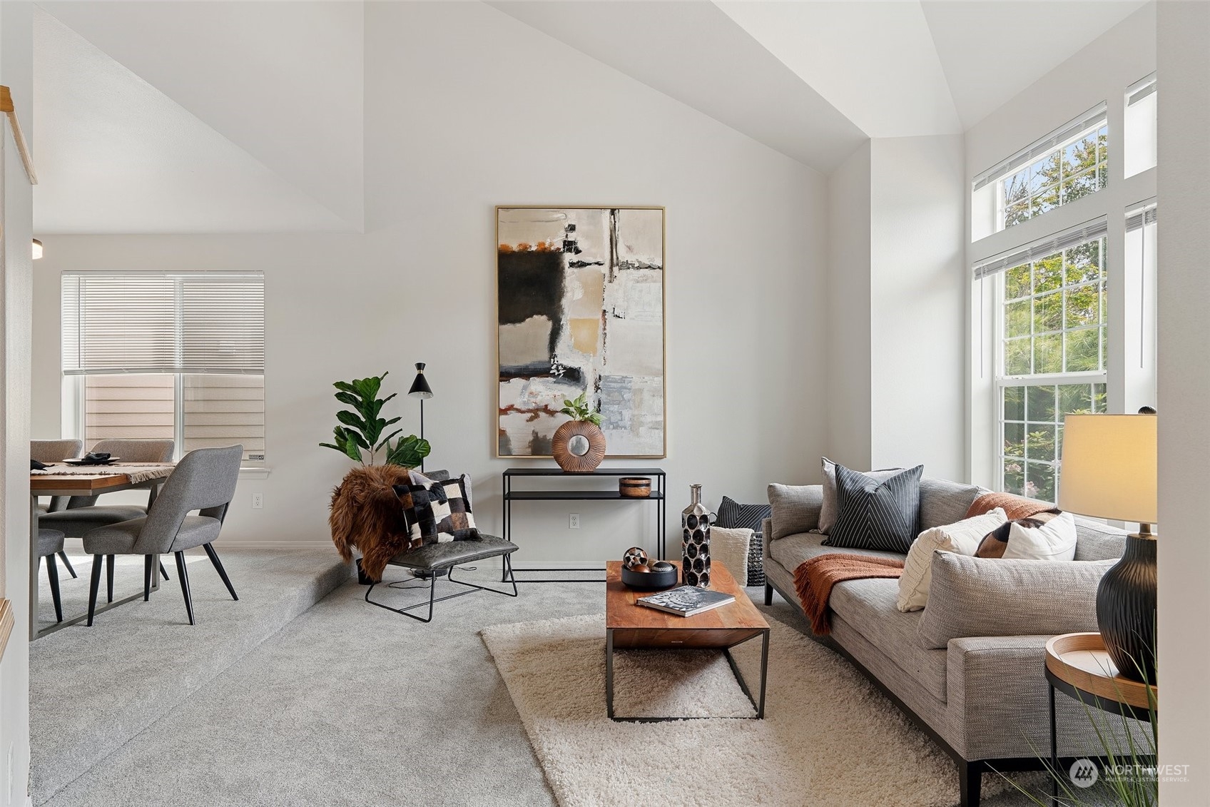 226 Whitman Place Northeast Renton, WA 98059 - Photo 5 of 26 a living room with furniture and a large window
