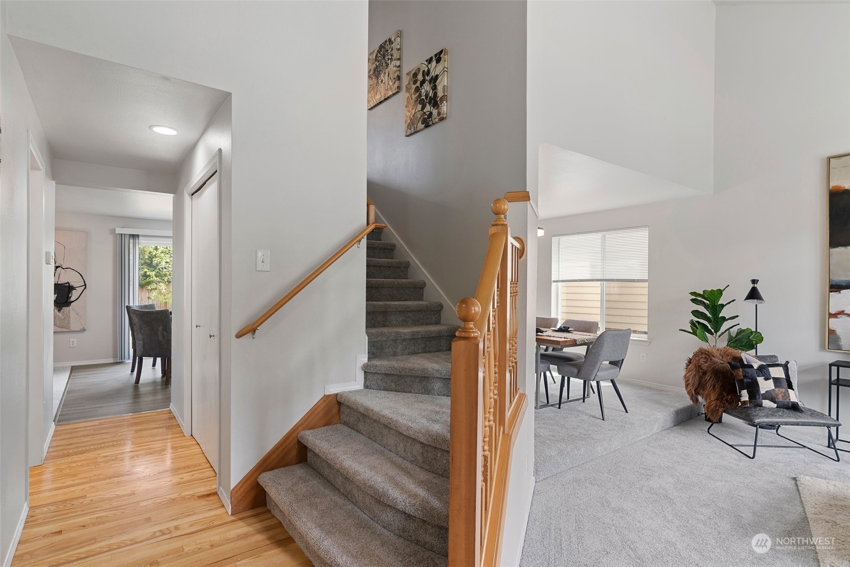 226 Whitman Place Northeast Renton, WA 98059 - Photo 7 of 26 a living room with furniture and a wooden floor