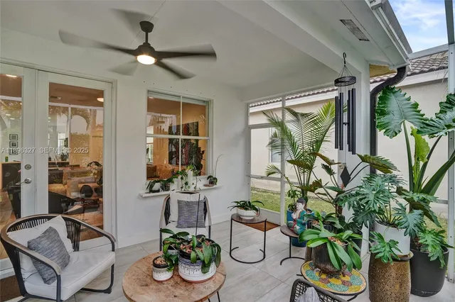 an aerial view of multiple houses with yard