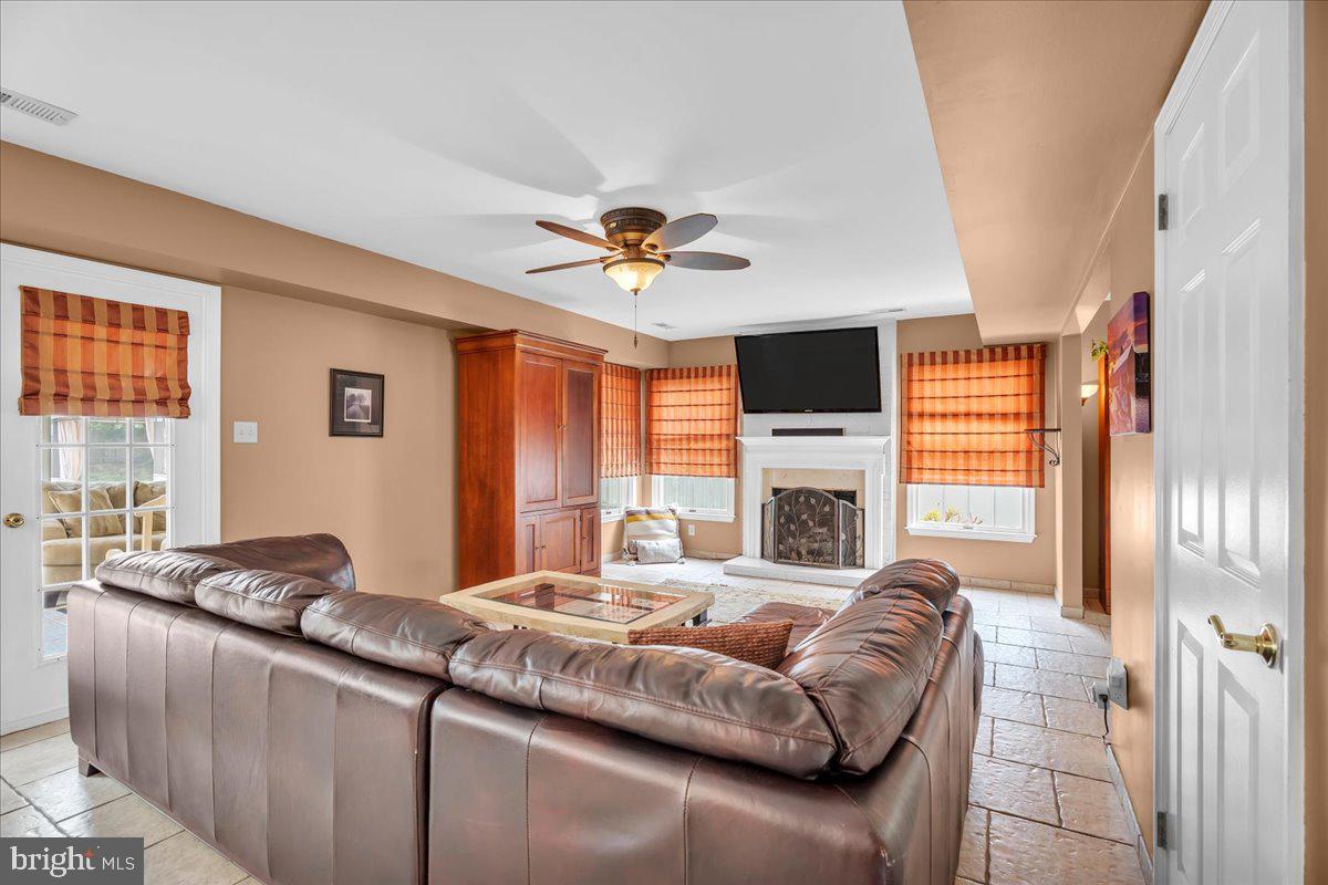 27 Spring Mill Drive Sewell, NJ 08080 - Photo 3 of 34 Cozy living space with warm tones.