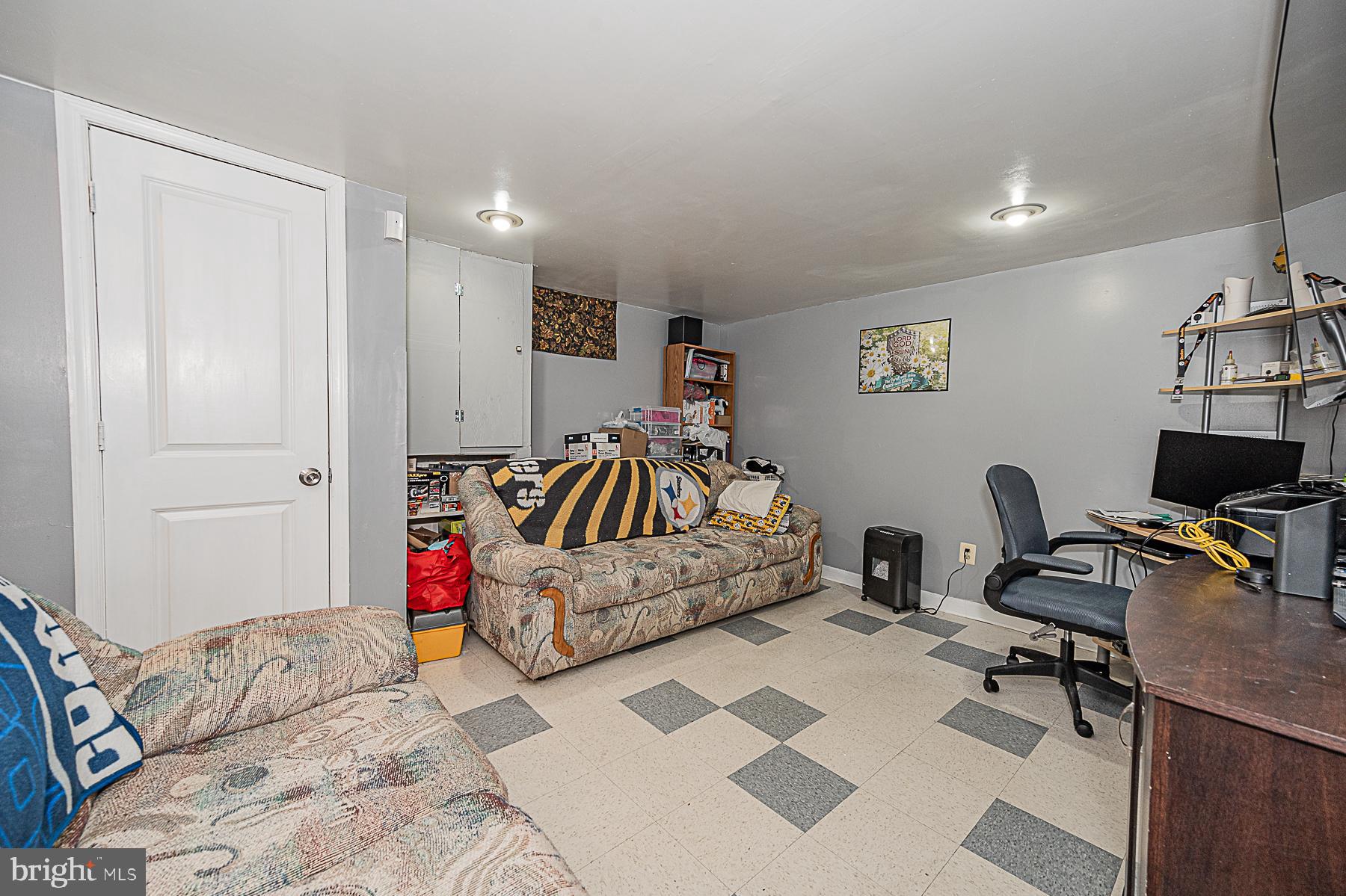 4837 Melbourne Road Baltimore, MD 21229 - Photo 21 of 29 LL Family Room w/ 1/2 BA and walkout to rear yard
