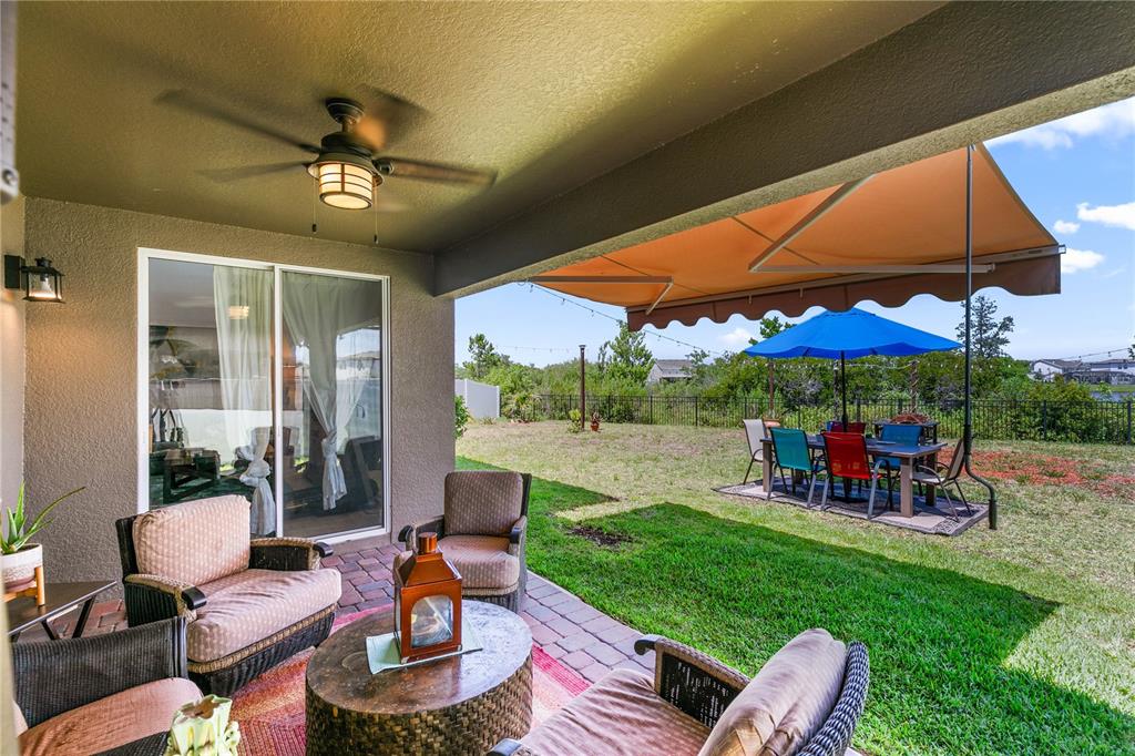 5637 Beggs Road St. Cloud, FL 34771 - Photo 28 of 35 a outdoor space with furniture and garden
