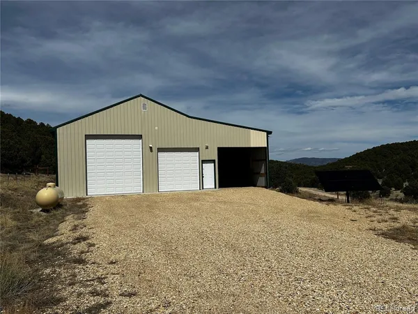 a front view of a house with yard