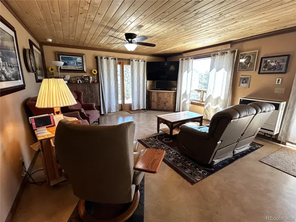 a living room with furniture and a window