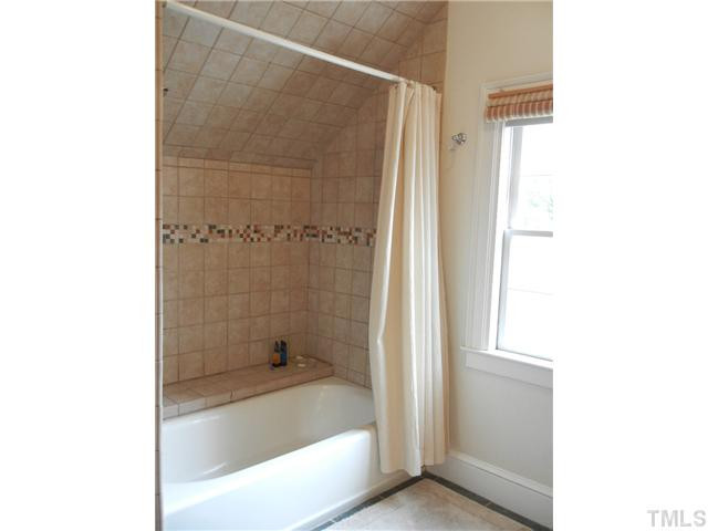 601 Harding Street Raleigh, NC 27604 - Photo 12 of 24 Tile work in owner's bathroom. It's a "real" tub - not one of those plastic things!