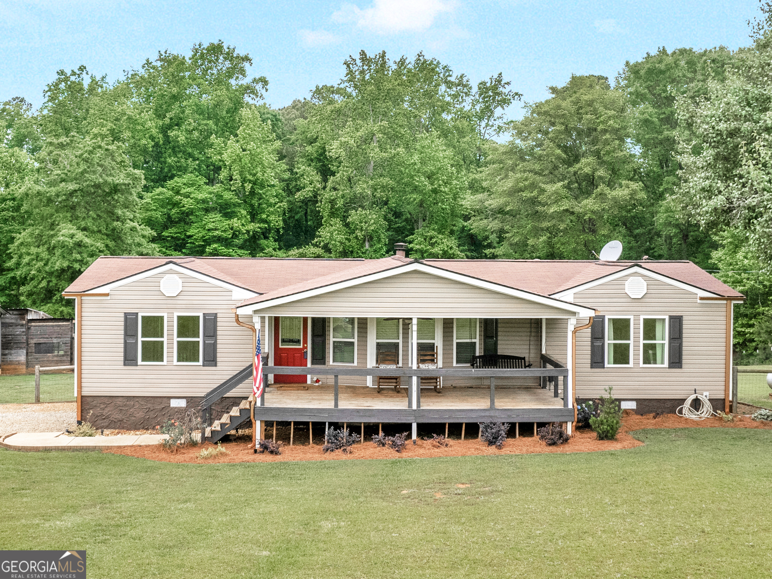347 Oak Road Jenkinsburg, GA 30234 - Photo 1 of 1 an aerial view of a house with swimming pool and sitting area