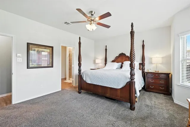 a bathroom with a double vanity sink and mirror