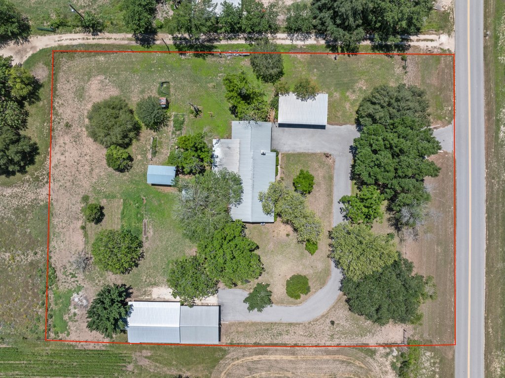 1961 Bolton Road Marion, TX 78124 - Photo 4 of 17 an aerial view of a house with garden space and outdoor space